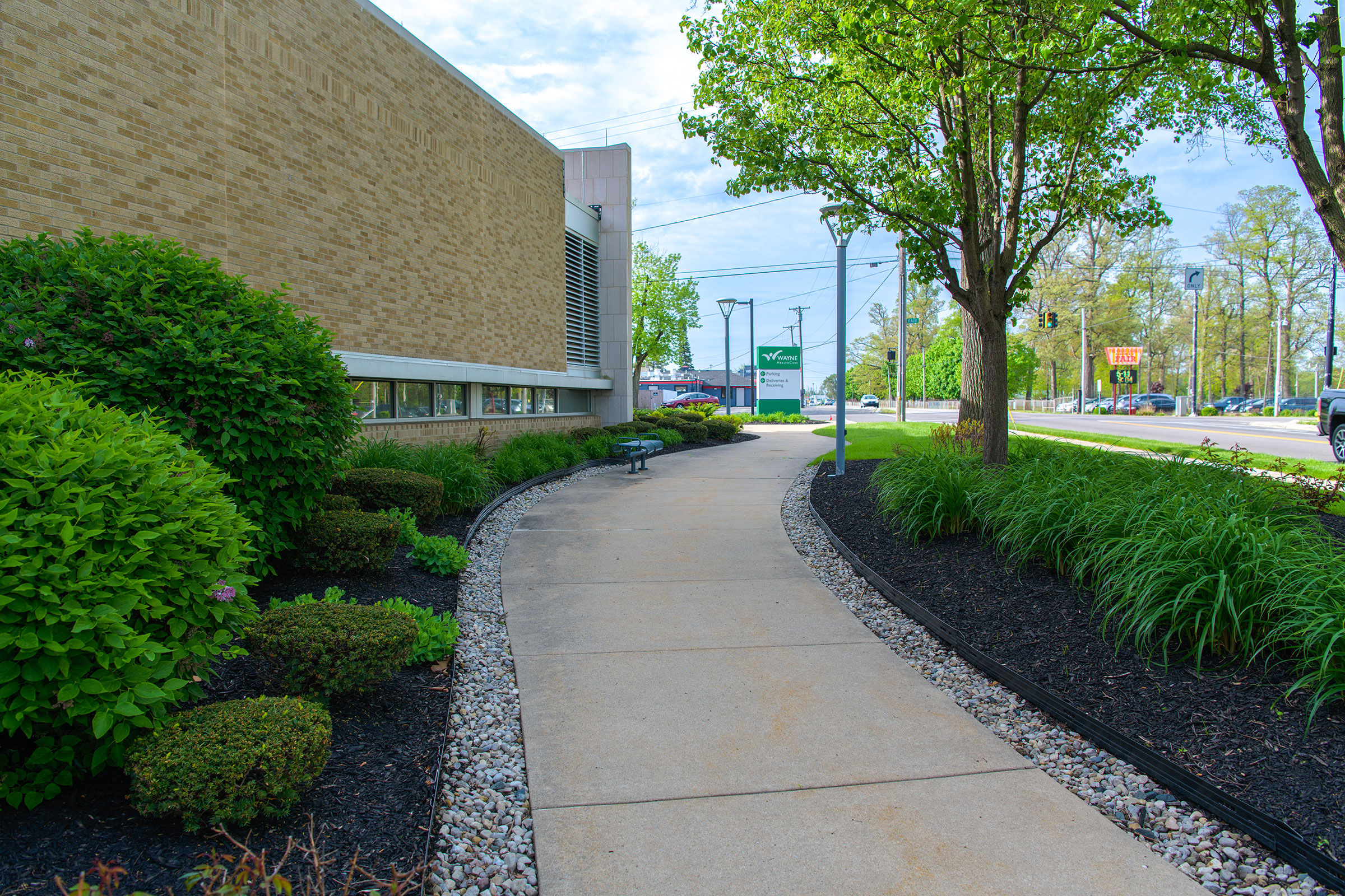 hardscaped area of a business with a paved walkway