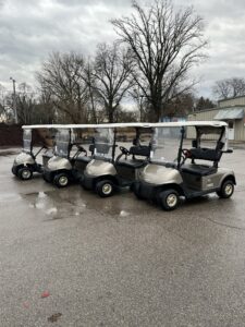 a row of high-quality golf carts for sale