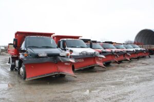 fleet of many snow plows